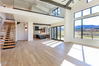 Welcome to 213 Harvester, a standout 4-bedroom with office on Eagle Ranch in Colorado - for sale on GolfHomes.com, golf home, golf lot