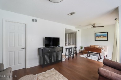 Experience comfort and style in this beautifully updated on Diamondhead Country Club in Mississippi - for sale on GolfHomes.com, golf home, golf lot