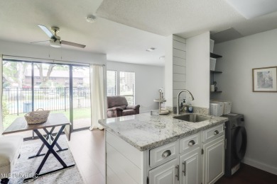 Experience comfort and style in this beautifully updated on Diamondhead Country Club in Mississippi - for sale on GolfHomes.com, golf home, golf lot
