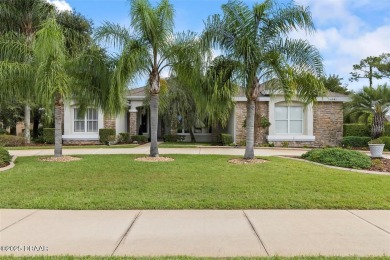 This exceptional estate home boasts a prime location on the golf on Plantation Bay Golf and Country Club in Florida - for sale on GolfHomes.com, golf home, golf lot