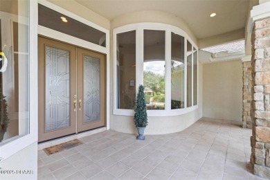 This exceptional estate home boasts a prime location on the golf on Plantation Bay Golf and Country Club in Florida - for sale on GolfHomes.com, golf home, golf lot