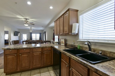 Experience the ultimate blend of comfort and prestige in this on Ledgestone Country Club and Golf Course in Missouri - for sale on GolfHomes.com, golf home, golf lot