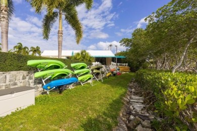 GOLF, TENNIS & PICKLEBALL INCLUDED! Fabulous one-level condo has on Riverbend Golf Club in Florida - for sale on GolfHomes.com, golf home, golf lot