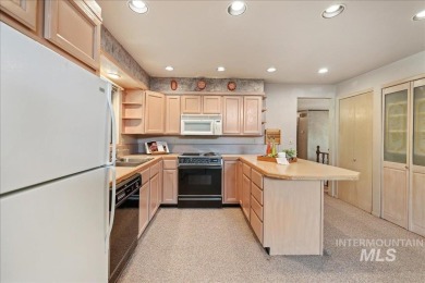 Nestled on the 2nd hole of the Indian Lakes Golf Course, this on Indian Lakes Golf Course in Idaho - for sale on GolfHomes.com, golf home, golf lot