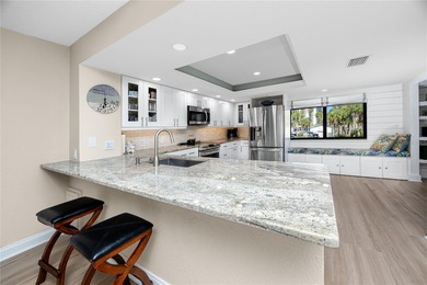 Experience true coastal living in this beautifully updated on Treasure Bay Golf and Tennis in Florida - for sale on GolfHomes.com, golf home, golf lot