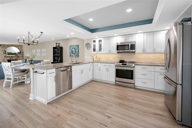 Experience true coastal living in this beautifully updated on Treasure Bay Golf and Tennis in Florida - for sale on GolfHomes.com, golf home, golf lot