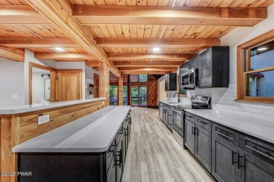 Situated on the golf course in Tanglwood Lakes, this stunning on Paupack Hills Golf and Country Club in Pennsylvania - for sale on GolfHomes.com, golf home, golf lot
