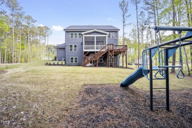 Welcome to 8237 Baronleigh Lane--a stunning single-family home on Hasentree Club in North Carolina - for sale on GolfHomes.com, golf home, golf lot