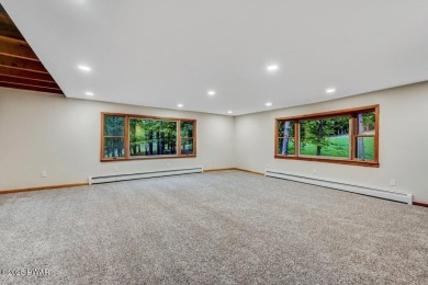 Situated on the golf course in Tanglwood Lakes, this stunning on Paupack Hills Golf and Country Club in Pennsylvania - for sale on GolfHomes.com, golf home, golf lot