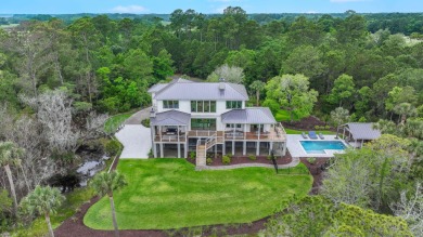 Discover the epitome of luxury living in this breathtaking on The Golf Club At Briars Creek in South Carolina - for sale on GolfHomes.com, golf home, golf lot