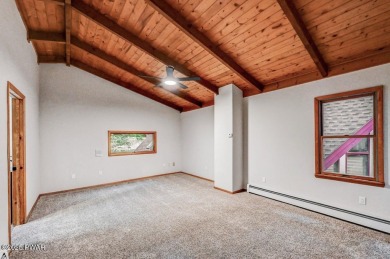Situated on the golf course in Tanglwood Lakes, this stunning on Paupack Hills Golf and Country Club in Pennsylvania - for sale on GolfHomes.com, golf home, golf lot