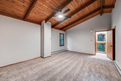 Situated on the golf course in Tanglwood Lakes, this stunning on Paupack Hills Golf and Country Club in Pennsylvania - for sale on GolfHomes.com, golf home, golf lot