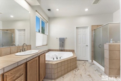 Experience luxury and tranquility in this beautifully remodeled on Dayton Valley Golf Club At Legado in Nevada - for sale on GolfHomes.com, golf home, golf lot