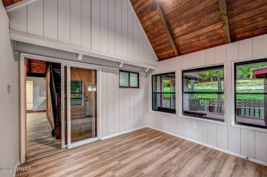 Situated on the golf course in Tanglwood Lakes, this stunning on Paupack Hills Golf and Country Club in Pennsylvania - for sale on GolfHomes.com, golf home, golf lot