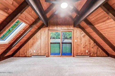 Situated on the golf course in Tanglwood Lakes, this stunning on Paupack Hills Golf and Country Club in Pennsylvania - for sale on GolfHomes.com, golf home, golf lot