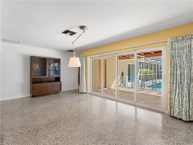 True mid-century architecture updated with thought and on Fort Myers Country Club in Florida - for sale on GolfHomes.com, golf home, golf lot