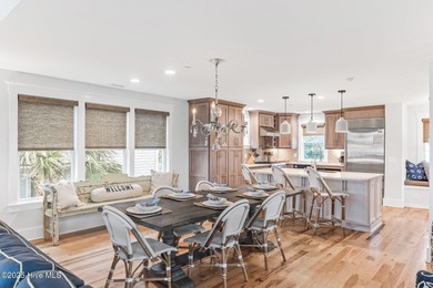 Coastal charm on one of the island's most iconic corners. At the on Bald Head Island Golf Club in North Carolina - for sale on GolfHomes.com, golf home, golf lot