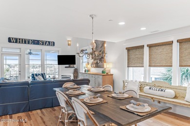 Coastal charm on one of the island's most iconic corners. At the on Bald Head Island Golf Club in North Carolina - for sale on GolfHomes.com, golf home, golf lot