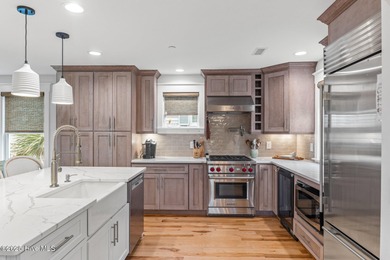 Coastal charm on one of the island's most iconic corners. At the on Bald Head Island Golf Club in North Carolina - for sale on GolfHomes.com, golf home, golf lot