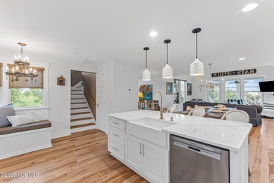 Coastal charm on one of the island's most iconic corners. At the on Bald Head Island Golf Club in North Carolina - for sale on GolfHomes.com, golf home, golf lot