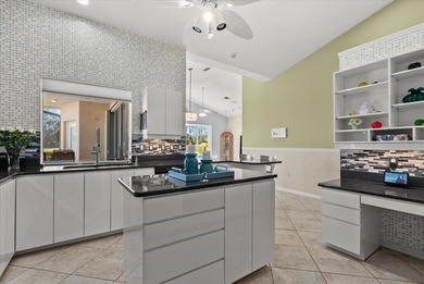 This elegant 3-bedroom, 2.5-bath home with an oversized 2.5-car on Waterford Golf Club in Florida - for sale on GolfHomes.com, golf home, golf lot