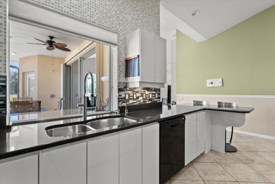 This elegant 3-bedroom, 2.5-bath home with an oversized 2.5-car on Waterford Golf Club in Florida - for sale on GolfHomes.com, golf home, golf lot