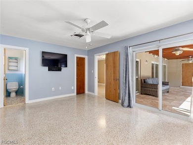 True mid-century architecture updated with thought and on Fort Myers Country Club in Florida - for sale on GolfHomes.com, golf home, golf lot