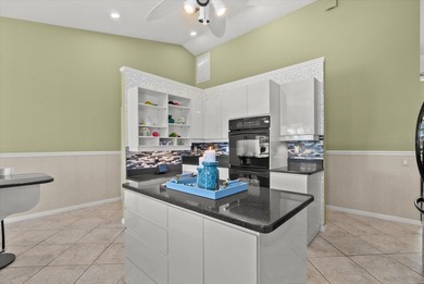 This elegant 3-bedroom, 2.5-bath home with an oversized 2.5-car on Waterford Golf Club in Florida - for sale on GolfHomes.com, golf home, golf lot