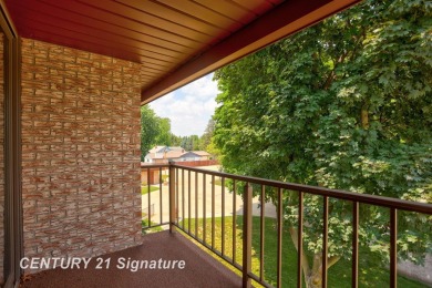 This top floor condo is located next to The Saginaw Country Club on Saginaw Country Club in Michigan - for sale on GolfHomes.com, golf home, golf lot