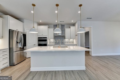 Welcome home to the sought-after Summerwood plan, perfectly on Chateau Elan Golf Club  in Georgia - for sale on GolfHomes.com, golf home, golf lot