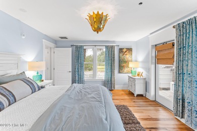 Coastal charm on one of the island's most iconic corners. At the on Bald Head Island Golf Club in North Carolina - for sale on GolfHomes.com, golf home, golf lot