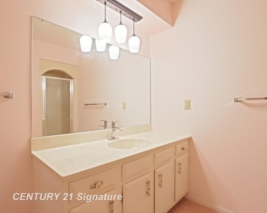 This top floor condo is located next to The Saginaw Country Club on Saginaw Country Club in Michigan - for sale on GolfHomes.com, golf home, golf lot