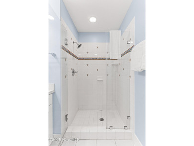 Coastal charm on one of the island's most iconic corners. At the on Bald Head Island Golf Club in North Carolina - for sale on GolfHomes.com, golf home, golf lot