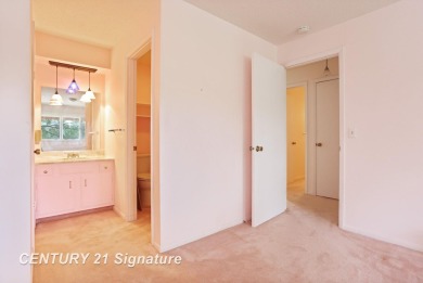 This top floor condo is located next to The Saginaw Country Club on Saginaw Country Club in Michigan - for sale on GolfHomes.com, golf home, golf lot