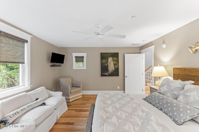 Coastal charm on one of the island's most iconic corners. At the on Bald Head Island Golf Club in North Carolina - for sale on GolfHomes.com, golf home, golf lot