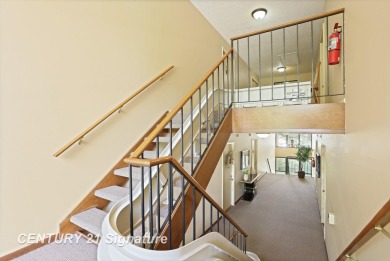 This top floor condo is located next to The Saginaw Country Club on Saginaw Country Club in Michigan - for sale on GolfHomes.com, golf home, golf lot