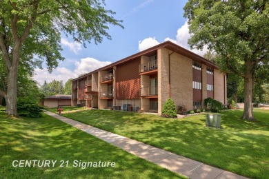 This top floor condo is located next to The Saginaw Country Club on Saginaw Country Club in Michigan - for sale on GolfHomes.com, golf home, golf lot