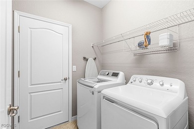 What a beauty! This home has it all. Incredible water, golf on Pelican Preserve Golf Club in Florida - for sale on GolfHomes.com, golf home, golf lot