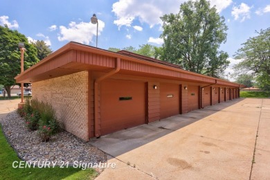 This top floor condo is located next to The Saginaw Country Club on Saginaw Country Club in Michigan - for sale on GolfHomes.com, golf home, golf lot