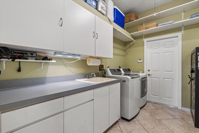 This elegant 3-bedroom, 2.5-bath home with an oversized 2.5-car on Waterford Golf Club in Florida - for sale on GolfHomes.com, golf home, golf lot