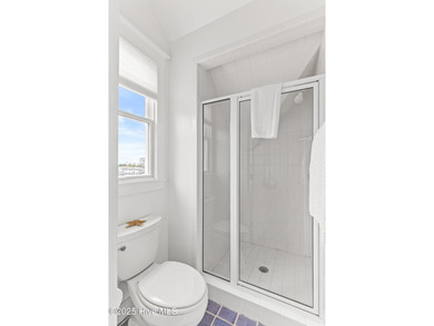 Coastal charm on one of the island's most iconic corners. At the on Bald Head Island Golf Club in North Carolina - for sale on GolfHomes.com, golf home, golf lot