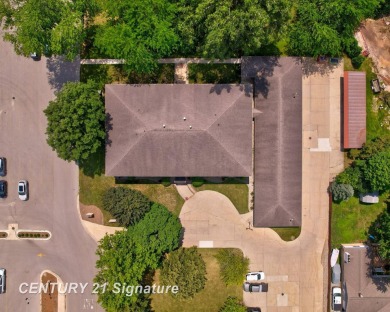 This top floor condo is located next to The Saginaw Country Club on Saginaw Country Club in Michigan - for sale on GolfHomes.com, golf home, golf lot
