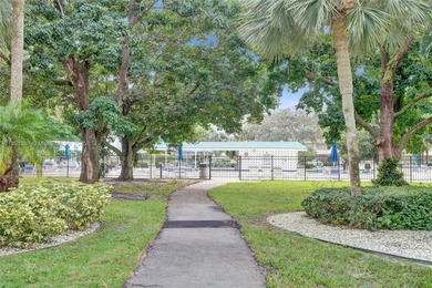 Welcome to Wynmoor Community in Coconut Creek. A highly on Wynmoor Golf Course in Florida - for sale on GolfHomes.com, golf home, golf lot