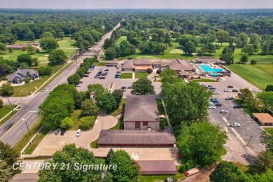 This top floor condo is located next to The Saginaw Country Club on Saginaw Country Club in Michigan - for sale on GolfHomes.com, golf home, golf lot