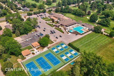 This top floor condo is located next to The Saginaw Country Club on Saginaw Country Club in Michigan - for sale on GolfHomes.com, golf home, golf lot