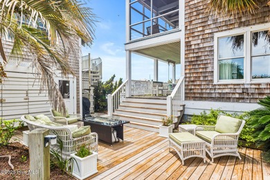 Coastal charm on one of the island's most iconic corners. At the on Bald Head Island Golf Club in North Carolina - for sale on GolfHomes.com, golf home, golf lot