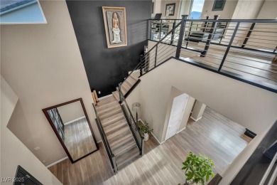 Experience elevated living in this sleek two-story estate on Falls Golf Course in Nevada - for sale on GolfHomes.com, golf home, golf lot