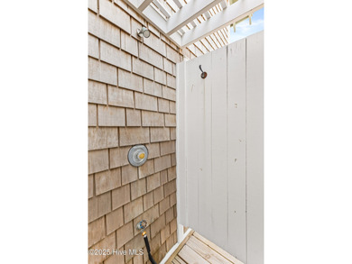 Coastal charm on one of the island's most iconic corners. At the on Bald Head Island Golf Club in North Carolina - for sale on GolfHomes.com, golf home, golf lot