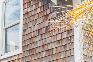 Coastal charm on one of the island's most iconic corners. At the on Bald Head Island Golf Club in North Carolina - for sale on GolfHomes.com, golf home, golf lot