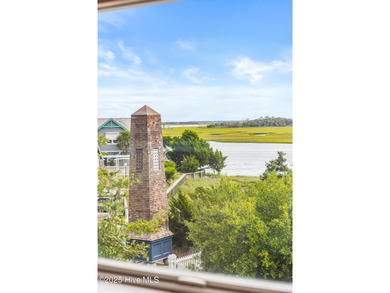 Coastal charm on one of the island's most iconic corners. At the on Bald Head Island Golf Club in North Carolina - for sale on GolfHomes.com, golf home, golf lot